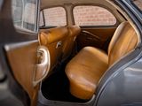 a brown leather seat in the back of a car