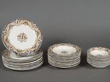 several plates and bowls are stacked on top of each other