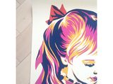 a poster of a woman with a bow on her head