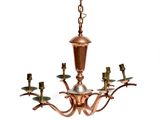 an image of a copper chandelier with five lights