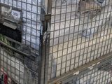 a large metal cart with a lot of items in it