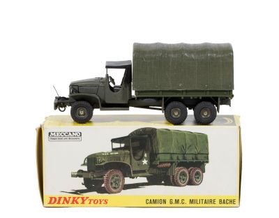 a toy truck that is sitting on top of a box