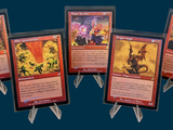 five cards of different colors and designs on a blue background
