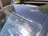 a car that has a broken windshield on it