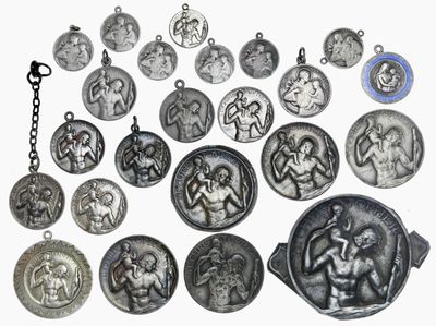 a lot of silver coins that are on a white surface