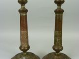 pair of antique brass candlesticks with etched designs