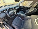 the interior of a car with a steering wheel, dashboard, and dash board