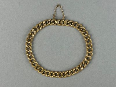 BRACELET en or jaune 750°/°° (18K) maille gourmette. - Photo 1