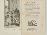 un livre ouvert sur lequel figure le dessin d'une femme en robe et d'un homme en robe
