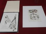 a drawing of a bird and a drawing of a bird on a table