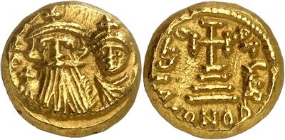 a gold coin with an image of a woman holding a cross