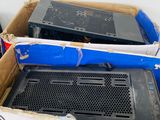 a box full of electronic equipment sitting on top of a table