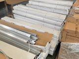 a lot of boxes and boxes on the floor in a warehouse