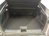 a trunk of a car with the back door open