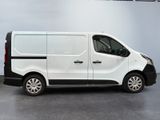 the white van is parked in the garage with its door open