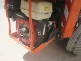 a small engine in the back of a truck