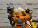 an orange and black machine that is sitting on a table