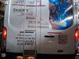 a van that has a sticker on the back of it