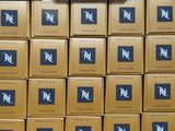 many boxes stacked on top of each other on the floor