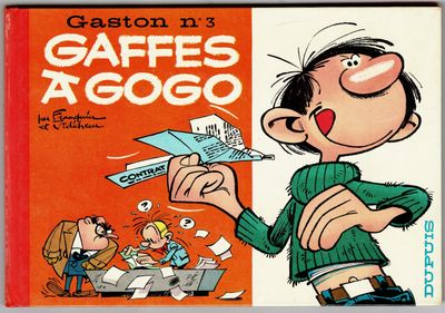la couverture du livre *Gaffe's Agogo*, avec un dessin représentant un homme tenant un avion en papier