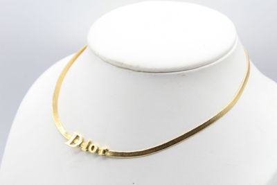 DIOR Collier ras de cou en métal doré LES BIJOUX, OBJETS ET … - Photo 1