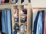 a room filled with lots of clothes and shoes