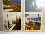 pictures of a man standing on a boat in the water