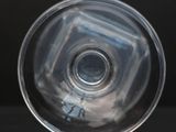 a close up view of a clear glass on a table