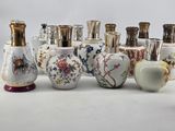many vases that are lined up together on the table