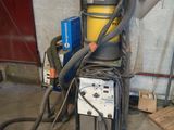 an image of a machine that is in a garage