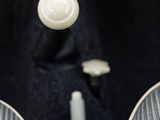 a close up view of a car ' s gear shift knob