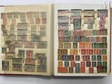 a book with stamps on the pages and a book with stamps on the pages