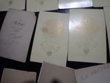 a lot of papers that are laying on a table