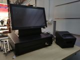 an image of a computer and printer on a desk