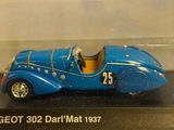 a blue model of a car in a clear box