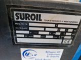 a close up of a parking meter with a sticker on it