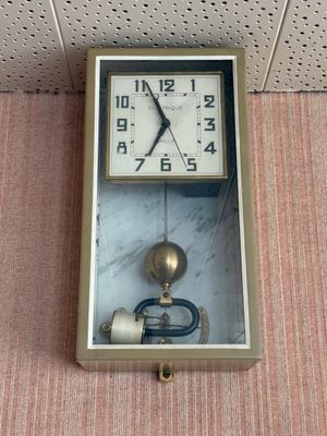 a clock that is hanging on the wall in the room