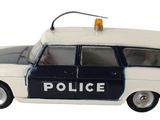 une voiture de police miniature blanche et bleue