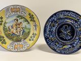 two plates that are sitting side by side on a table