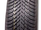 a close up of a tire on a white background