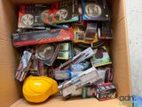 a cardboard box filled with many different types of electronics