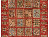 a red rug with a patchwork design on it