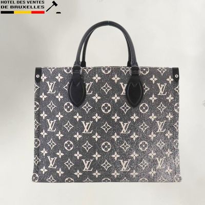 louis vuitton monogram canvas tote bag with black leather handles