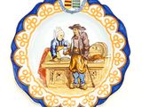 a plate with a picture of a man and a woman on it