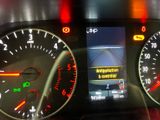 a picture of a car dashboard with various gauges