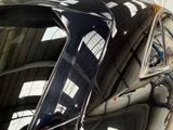 a reflection of a car in the rear window of a car