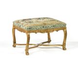 an image of a wooden bench with a floral upholstered seat