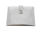 a silver purse with a metal clasp on the front