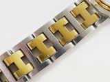 an image of a close up of a wrist watch on a white surface