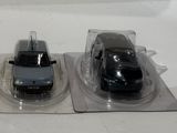 three toy cars that are sitting on top of each other